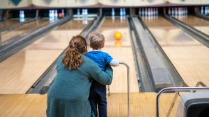 two-people-bowling-alley